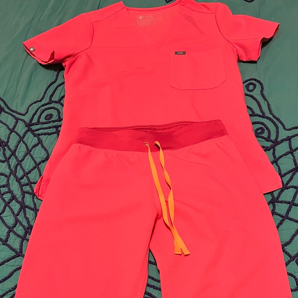 Pair of neon pink scrubs